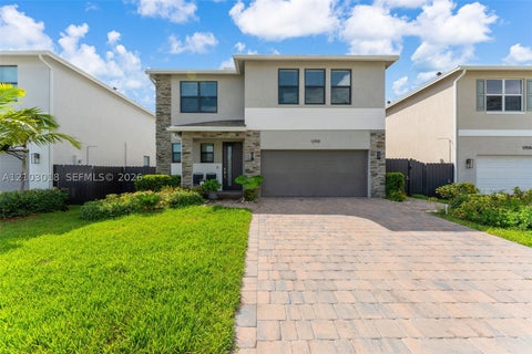 Photo of 12918 SW 266th Ter, Homestead, FL 33032 (MLS # A12103018)