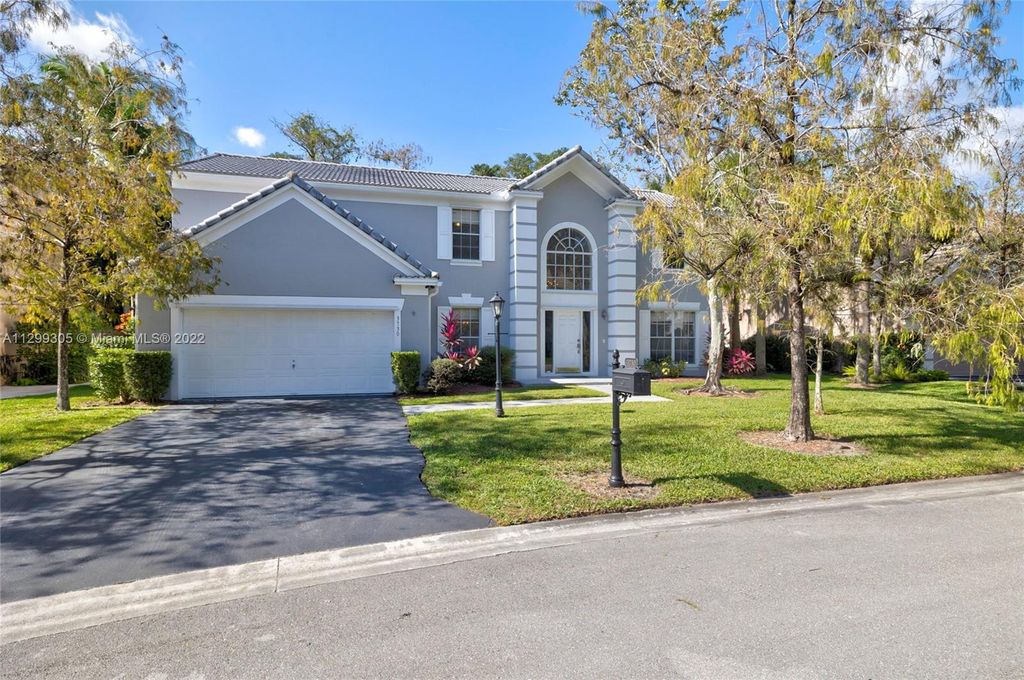 Photo of 3730 Cypress Fern Way, Coral Springs, FL 33065 (MLS # A11299305)