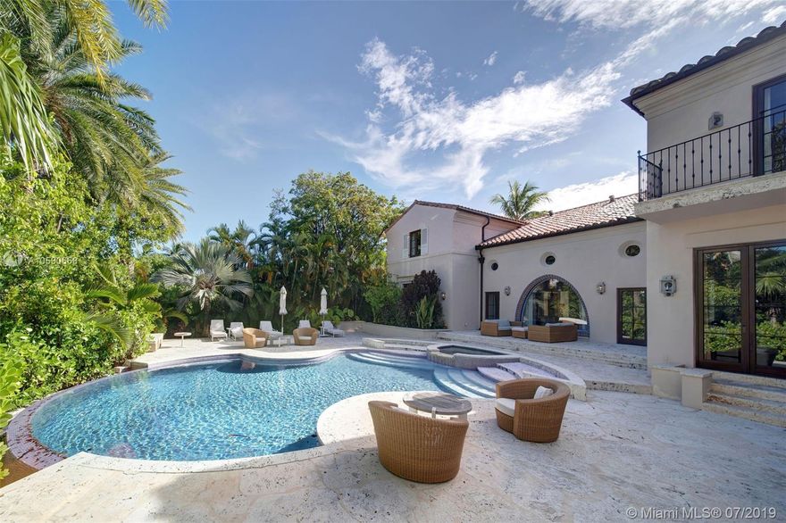 Luxury Miami living is yours in this newly-constructed 9 BR, 10+1 BA estate masterfully crafted by Architectural Digest's Top 100 Architects and Designers' Katherine Newman & Peter Cebulak. Its immaculate outdoor space boasts 100 FT of water frontage on a 27,600 SF lot allowing for the most exclusive entertaining experiences. This home spares no detail; the gated entrance with Chicago brick motor court is perfect for any car enthusiast to showcase their automobile collection. The home’s interior is complemented with perfect color palette choices, natural lighting, high ceilings, and timeless luxurious finishes. A separate 4 BR 5 BA guest house is perfect for the in-laws and friends. Also featured is a full gym, new seawall, dock, and a marvelous pool.