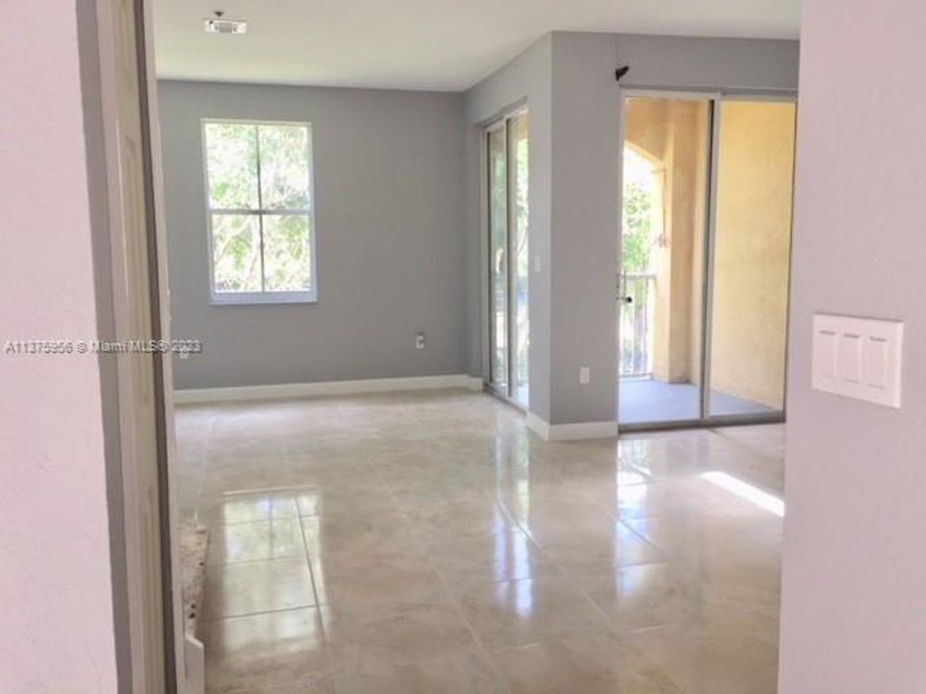 Photo of 4301 SW 160th Ave #214, Miramar, FL 33027 (MLS # A11375956)