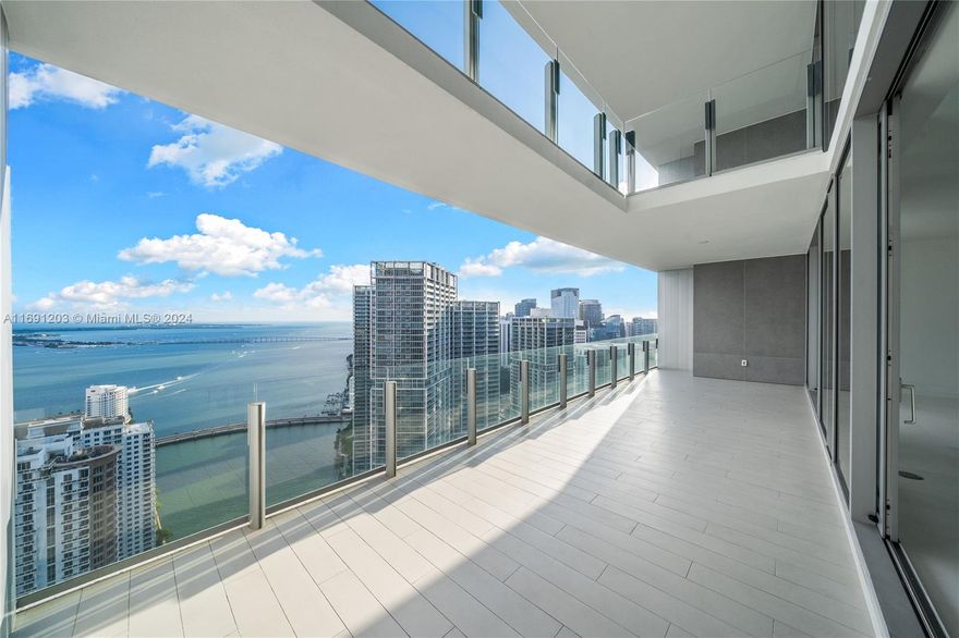 Sky Villa Duplex
Soaring 48 floors above the city, this extraordinary, brand-new Sky Villa is one of only three.  Breathtaking, unobstructed ocean views mesmerize from this monumentally spacious residence, boasting double-height ceilings  5,079 sq ft includes 5 bedrooms, family room, den, and laundry, easily configurable into 6 or 7 bedrooms 3 park spaces
Two enormous oceanfront terraces—one private for the master suite— A chef's dream kitchen features top-of-the-line Gaggenau appliances and a floor-to-ceiling wine cellar  The fabulous master bath and dressing room offer a spa-like experience
42,000 sq ft of world-class amenities await: virtual golf, private theater, iconic 55th-floor pool, two-level gym, spa, and helipad This is more than a home; it's a lifestyle of unparalleled luxury