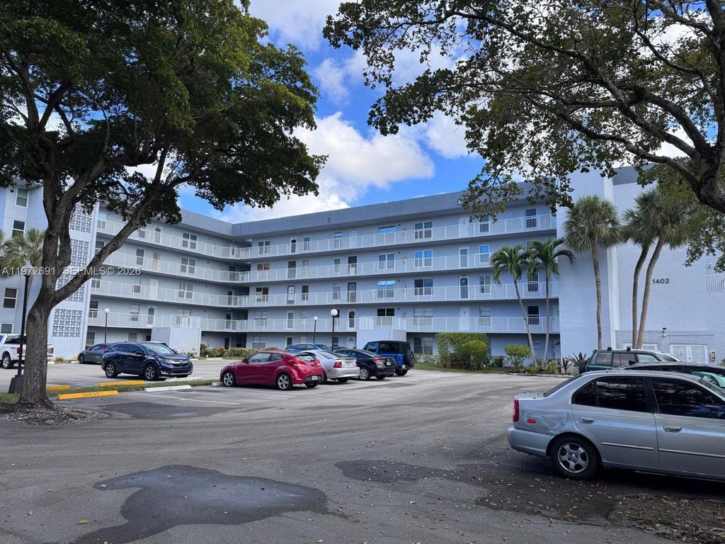 Photo of 1402 NW 80th Ave #107, Margate, FL 33063 (MLS # A11972691)