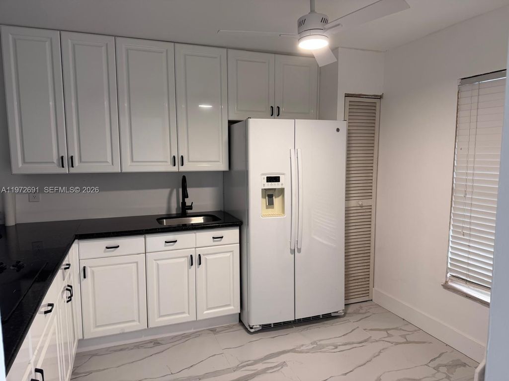 Photo of 1402 NW 80th Ave #107, Margate, FL 33063 (MLS # A11972691)