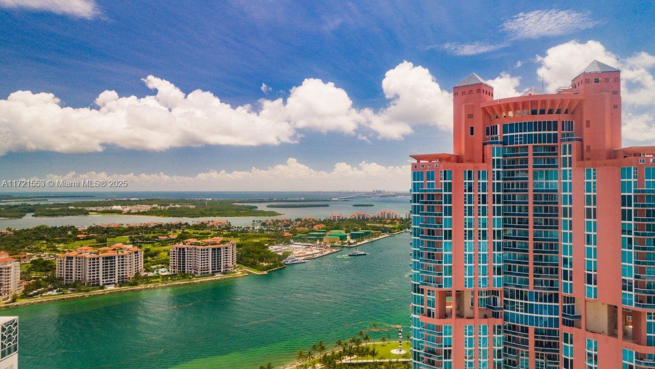 Rarely available, Lowest priced beautiful converted fully renovated two Bedrooms in prestigious Portofino Tower. Bay views, overlooking the pool. A clean modern design and semi-private foyer. Full amenity luxury building with world class spa on the 29th floor, tennis, valet, concierge services. All assessments have been paid. Be part of the South of 5th lifestyle. Just steps to the ocean, marina, park, and fabulous restaurants. Lowest priced converted 2 bedroom in Portofino Towers. “Turnkey” remodeled. New furnishings, facing Fisher Island overlooking Cruise ship Alley. Easy to show.