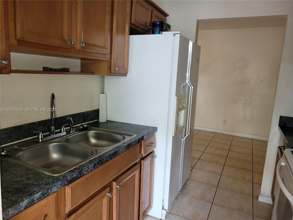 Photo of 8704 NW 35th St #105, Coral Springs, FL 33065 (MLS # A12011206)