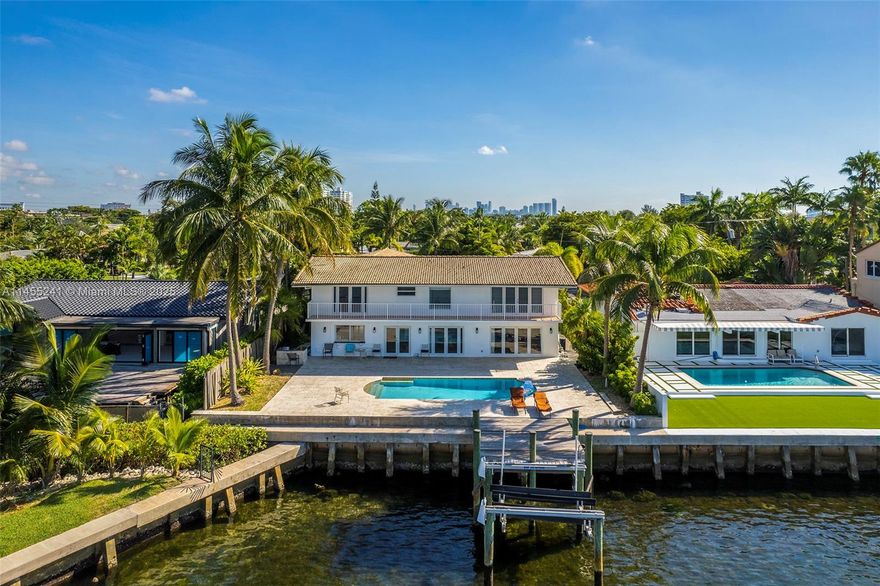 WIDE BAYFRONT LOCATION - SOUTH EXPOSURE.  Unobstructed views of Biscayne Bay and Miami skyline. Renovate or build your dream home. 75 ft new seawall, large new dock, pool and patio. Sans Souci Estates is a 24/7 gated community one a very quiet street, mostly local traffic. House can be Leased or move into. Vacant.  Great location with easy access to highways, close to MIA airport, Aventura/Bal Harbour, shops and beaches.