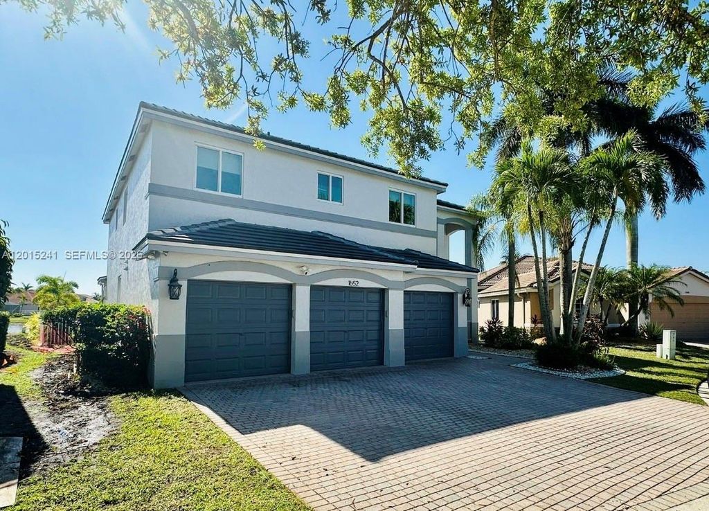 Photo of 1652 Orchid Bnd, Weston, FL 33327 (MLS # A12015241)