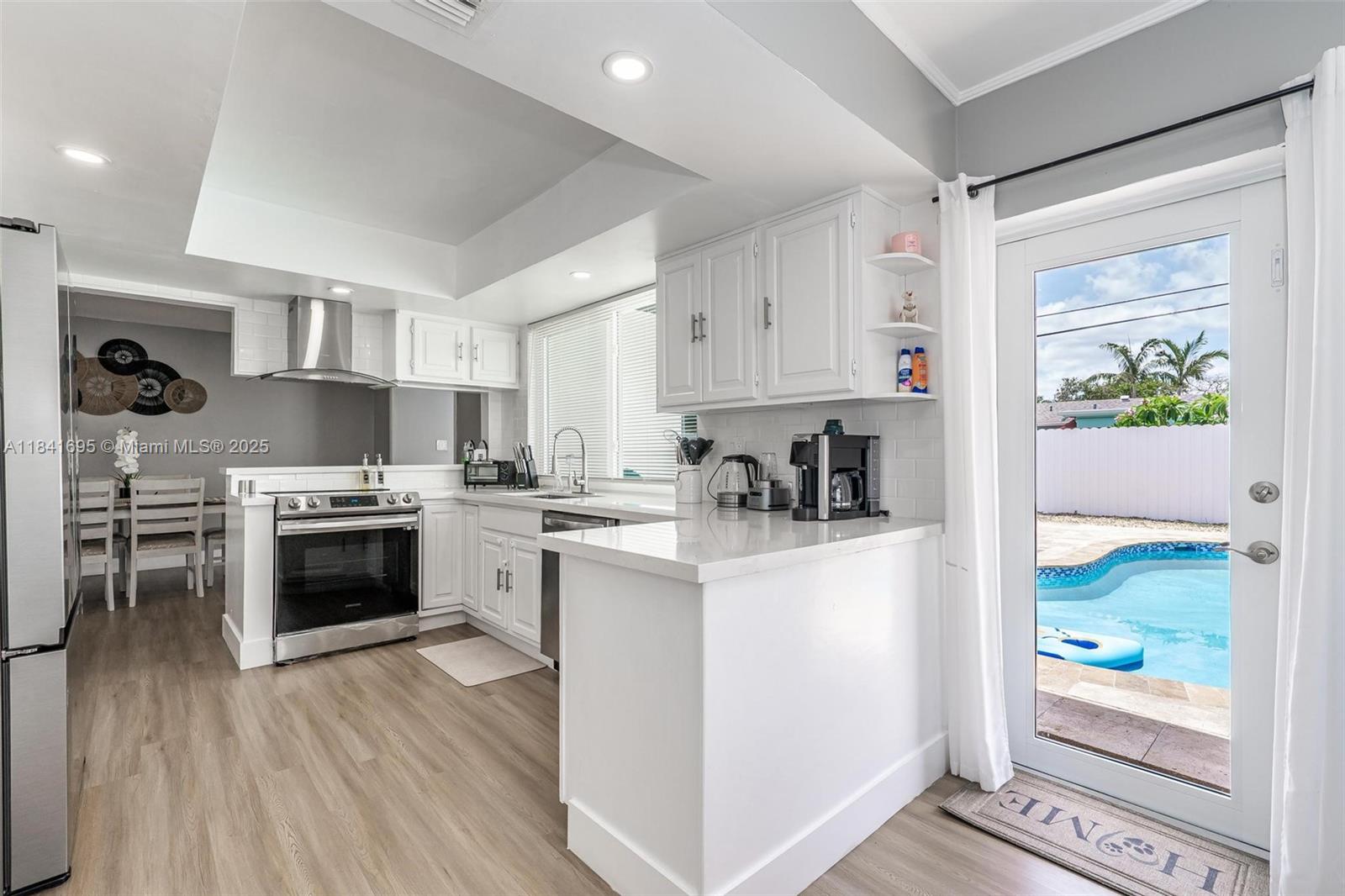 Experience the ultimate Florida lifestyle in this stunning 3 bed, 2 bath modern home with a private pool and one-car garage! This is the perfect home for investors or 1st time home buyers. Home features include a Brand New roof, fully fenced yard, IMPACT WINDOWS AND DOORS and recessed lighting throughout. Enjoy beautiful vinyl & porcelain flooring, kitchen with quartz countertops & new stainless steel appliances. The expansive open floor plan is perfect for hosting gatherings & creating unforgettable memories. No HOA! Conveniently located just minutes from the iconic **Hard Rock Guitar Hotel** with easy access to Hollywood Beach, 441, I-95, the Florida Turnpike, shopping, Memorial Regional Hospital, restaurants, & more. Don't miss this one! Schedule your private tour today!