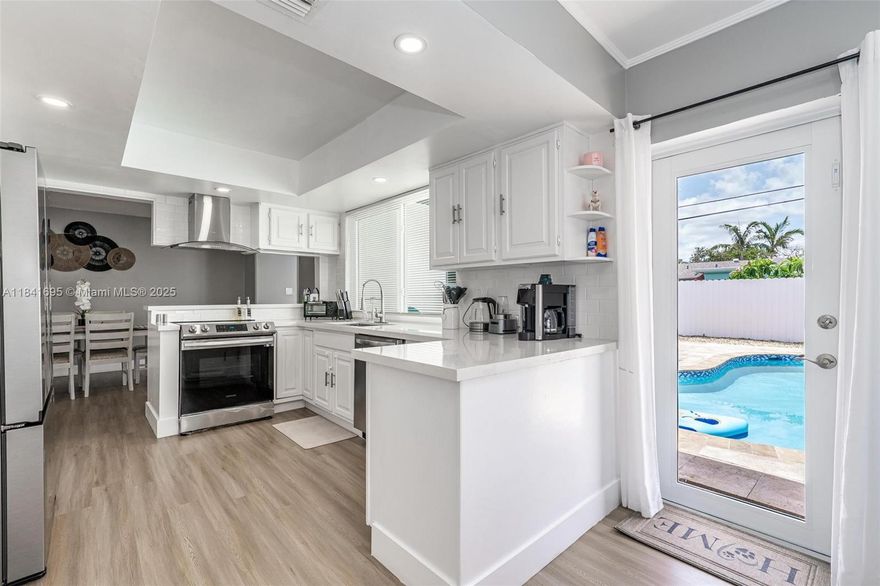 Experience the ultimate Florida lifestyle in this stunning  3 bed, 2 bath modern home with a private pool and one-car garage! This is the perfect home for investors or 1st time home buyers. Home features include a Brand New roof, fully fenced yard, IMPACT WINDOWS AND DOORS and recessed lighting throughout. Enjoy beautiful vinyl & porcelain flooring, kitchen with quartz countertops & new stainless steel appliances. The expansive open floor plan is perfect for hosting gatherings & creating unforgettable memories. No HOA! Conveniently located just minutes from the iconic **Hard Rock Guitar Hotel** with easy access to Hollywood Beach, 441, I-95, the Florida Turnpike, shopping, Memorial Regional Hospital, restaurants, & more. Don't miss this one! Schedule your private tour today!