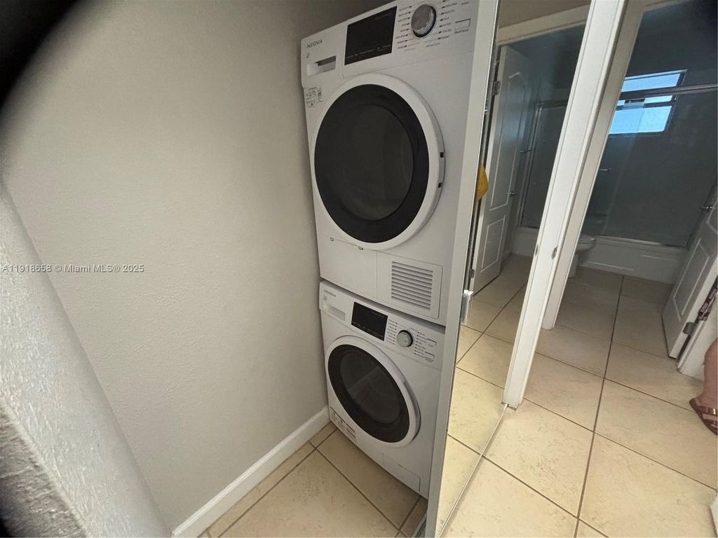 Photo of 4871 NW 9th Dr #4871, Plantation, FL 33317 (MLS # A11918658)