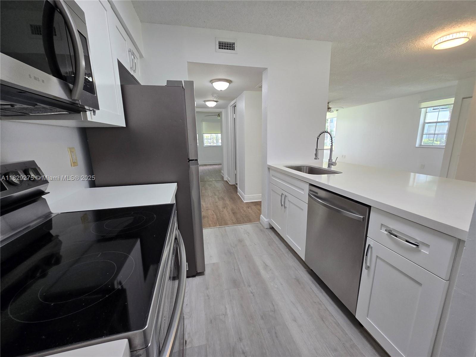2890 N Oakland Forest Dr 102