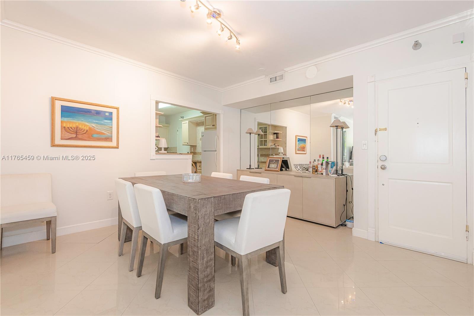10185 Collins Ave 212
