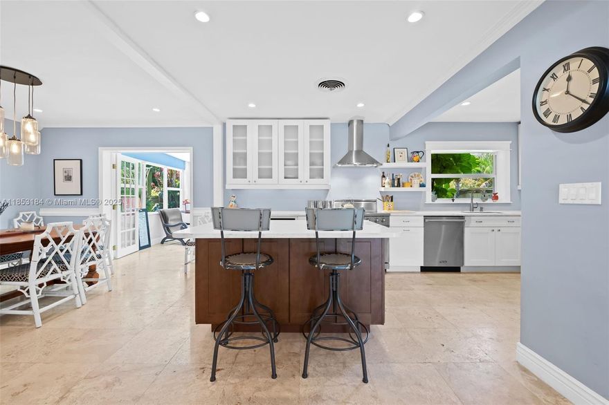 Welcome to serene, beautifully updated, chic Wilton Manors sanctuary. It offers the perfect blend of privacy, style and functionality. Step inside to discover a bright, open layout with abundance of natural lights, travertine marble & terrazzo flooring, high impact windows and doors, tastefully updated bathrooms. Flat tile roof replaced in 2015, A/C 2022, hot water heater 2024, fence 2020, Gourmet kitchen featuring high-end Viking appliances, island and cabinetry galore. This is perfect place for entertainment. The living area extends to a private backyard oasis w/ free shape pool surrounded by tropical lush greenery. It is hard to convey the beauty of the truly enchanting garden especially in nighttime. Great privacy w/11,329sf.ft. One car carport & shed offer extra space for storage.