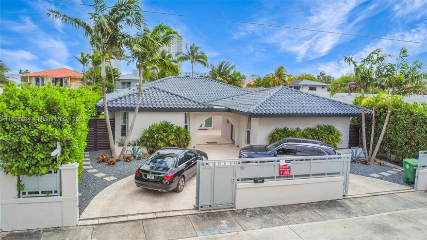 Over $250K of complete renovations await all boating enthusiasts! Nestled in Miami's prestigious Baycrest, this stunning 65ft waterfront mid-century modern residence offers beautiful views and only 100 yards away from the wide open Biscayne Bay. Located on a cul-de-sac this extremely private gem has an open & spacious split floor plan with an open Italian gourmet kitchen adorned with quartz countertops and equipped with top-of-the-line Viking stainless steel appliances, perfect for the snobbiest chefs! Boasting an impressive 65 ft of prime water frontage complete w/ a boat lift brand new dock, this property provides direct bay access w/ no fixed bridges. Completely fenced (electronic gates), lush landscaping with a covered terrace perfect for entertaining. Best deal, check comps!