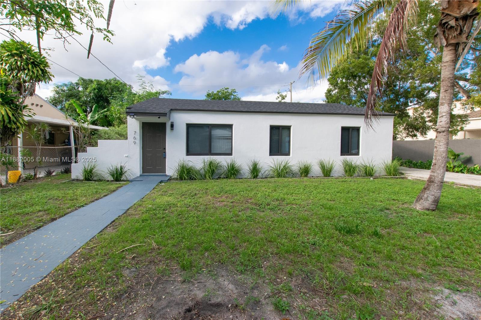 Beautifully updated 3 bedroom, 2 bathroom single family home in the sought-after Gratigny Place subdivision. Enjoy modern living with stylish fixtures, stainless steel appliances, and open living spaces filled with natural light. The spacious driveway provides ample parking, while the fenced yard offers privacy and room to relax. Mature Mango tree creates a serene backyard retreat, perfect for entertaining or quiet evenings outdoors. Conveniently located near shopping, dining, and major highways—this move-in ready home is a true gem!