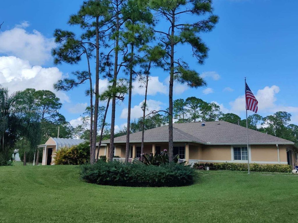 Photo of 15565 N 133rd Ter N, Jupiter, FL 33478 (MLS # A11635071)