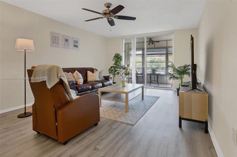 Photo of 7300 NW 17th St #220, Plantation, FL 33313 (MLS # A11904024)