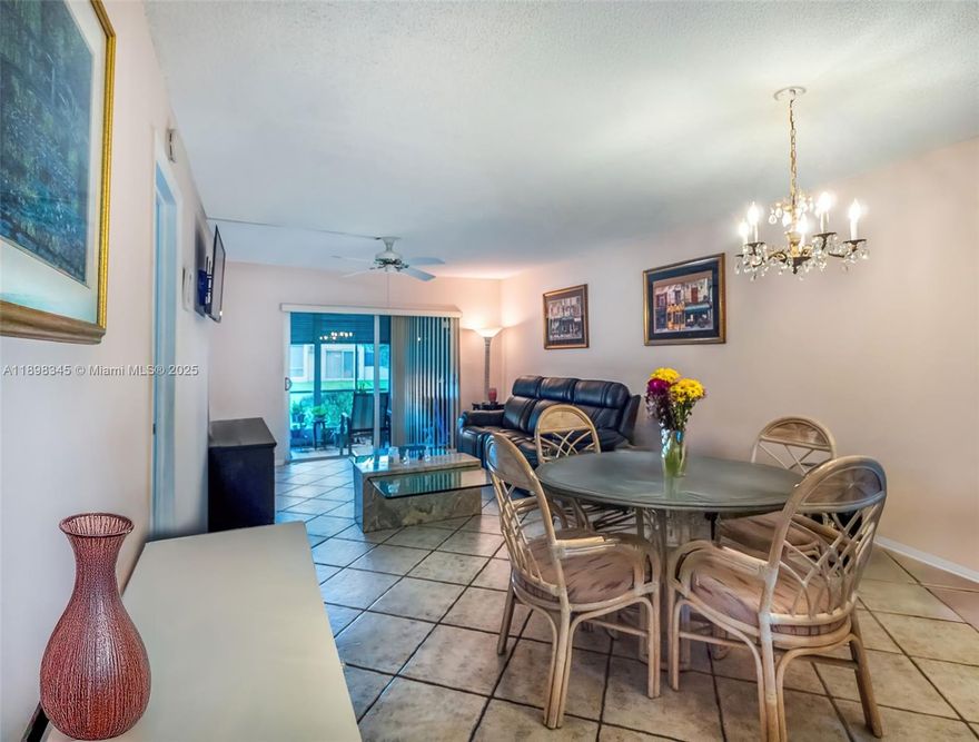 Step into comfort & peace of mind with this beautifully maintained first-floor condo. Designed for everyday living, this inviting home features hurricane impact windows & doors throughout, offering safety, efficiency, & quiet comfort in any season. The kitchen offers recessed lighting and a functional layout, ideal for cooking. The spacious primary suite is a true retreat, complete w/2 walk-in closets & a private bath. Both bathrooms feature elegant glass shower doors & tasteful finishes that add a modern touch. Enjoy your morning coffee or unwind in the evening on the screened-in patio, overlooking a peaceful setting that feels private and relaxing. Additional features include extra storage space, a split bedroom layout for added privacy, & convenient 1st-floor access. Move in ready!