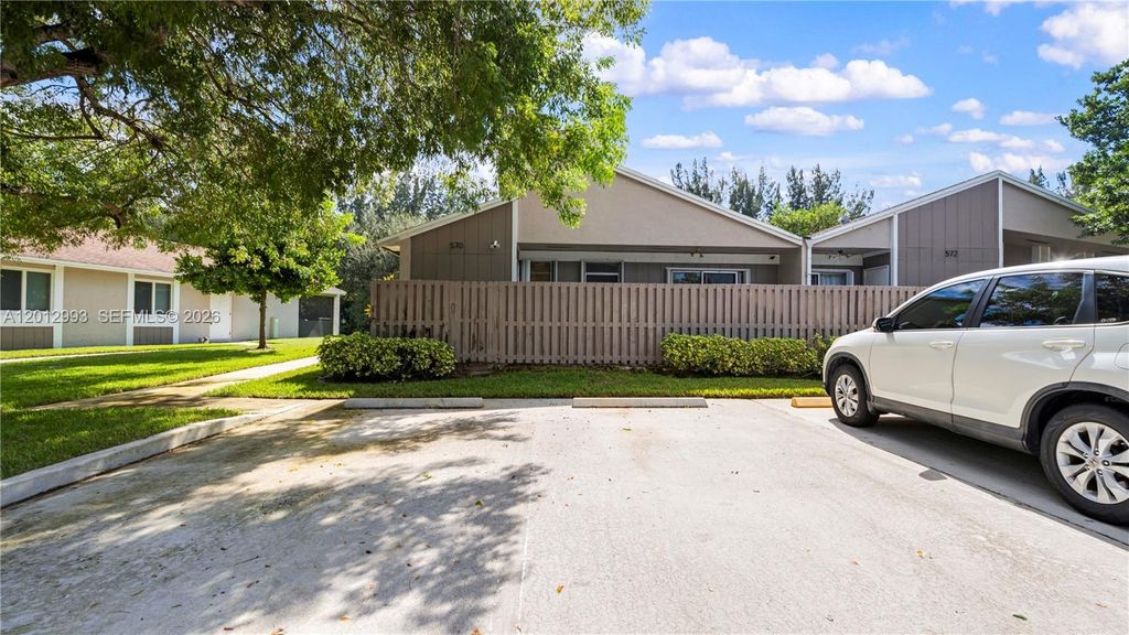 Photo of 570 Woodgate Cir #A, Sunrise, FL 33326 (MLS # A12012993)