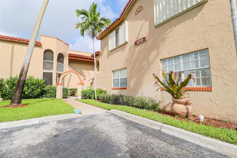 Photo of 8713 SW 5th St #208, Pembroke Pines, FL 33025 (MLS # A11857303)