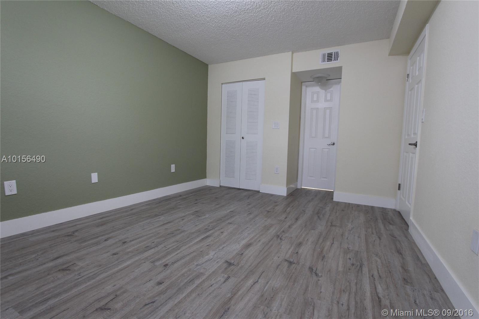 Nice and cozy unit completely remodeled. Brand new cabinets kitchen, appliances, bathrooms and floors. The wall are covered with soft green and almond colors, making the unit welcoming. Washer and Dryer are inside and there is one parking space. Enjoy the pool, exercise room and game rooms child play area, pool table, all surrounded by a gorgeous landscaping. Excellent location.
