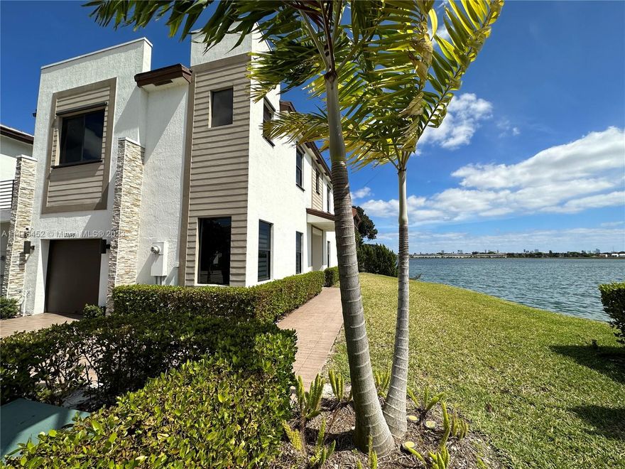 Lakeview / corner unit 4 BR/ 3.5 BA. Las Ramblas by Via Ventura. Open Floor-Plan, Side Entry, w/Large Chef's Island Featuring Custom Granite, Stainless Steel Appliances, 1/2 bath on Main Level, w/ 3 Full baths upstairs. Master Suite w His/ Hers vanities / High rise. Park, Gated Community. Via Ventura offers Pool, Jacuzzi, Clubhouse, Spa, Fitness, Playground. Easily Accessible to I95 & Tpke, 10/15 min from the beach, Aventura Mall and many restaurants. Don't miss this great opportunity!!