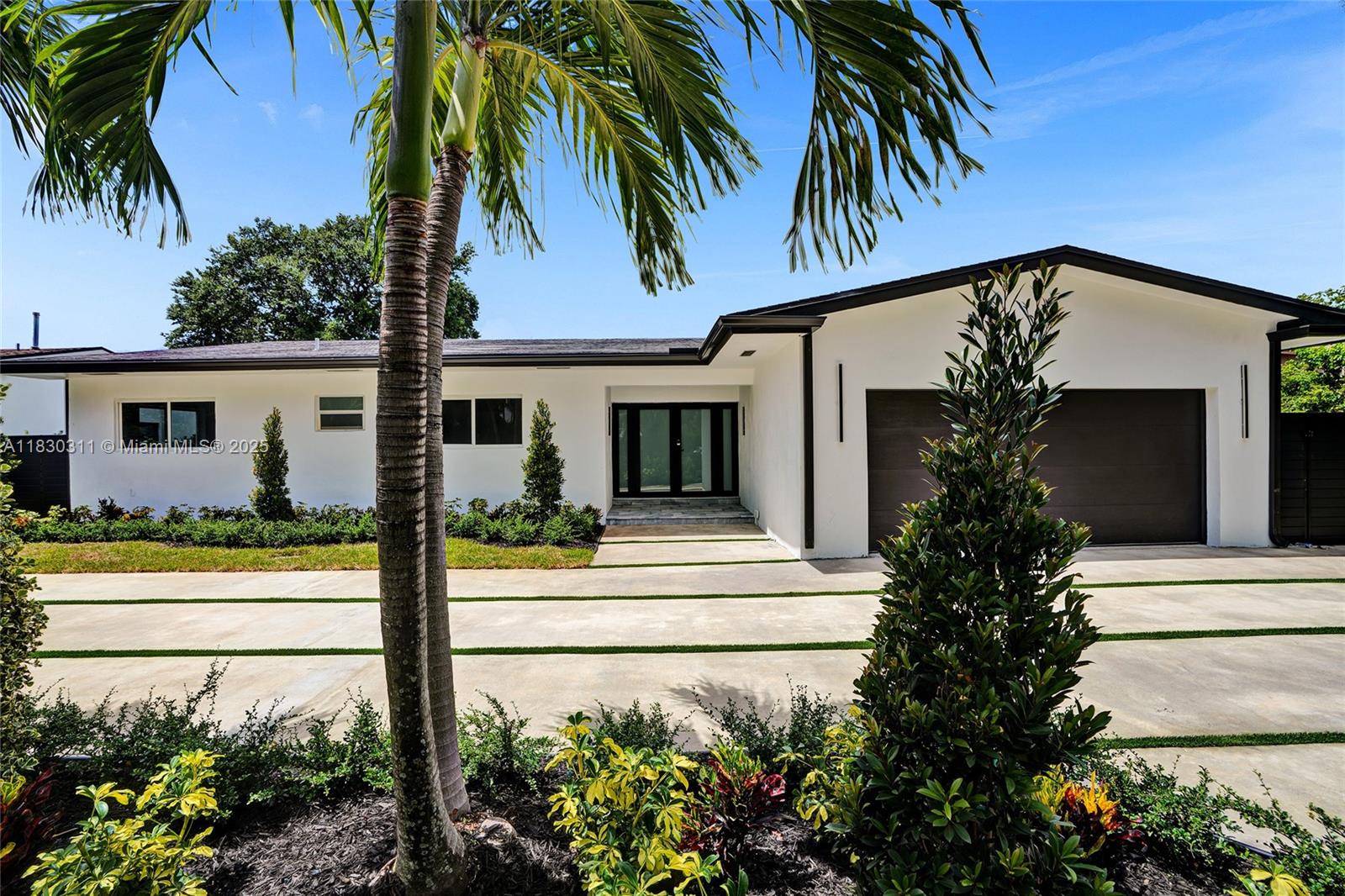 Experience luxury living in this fully remodeled 5BR/5BA, 2,505 sqft. home in sought-after Sky Lake. Enjoy a bright, open layout with elegant features and designer finishes. The kitchen includes marble counters and Samsung Smart appliances all under warranty. Four bedrooms include en-suite baths with custom closets and LED-lit mirrors. . Outside, a resort oasis features a brand-new pool with sun shelf, new pool equipment, surrounded by professional landscaping. The fully fenced yard and electric gated driveway offer privacy and security. Impact windows and doors throughout for added peace of mind. Within close proximity to houses of worship, top dining, Aventura Mall, schools, parks, and major highways. This stunning home is a magnificent turnkey opportunity in the heart of Miami.