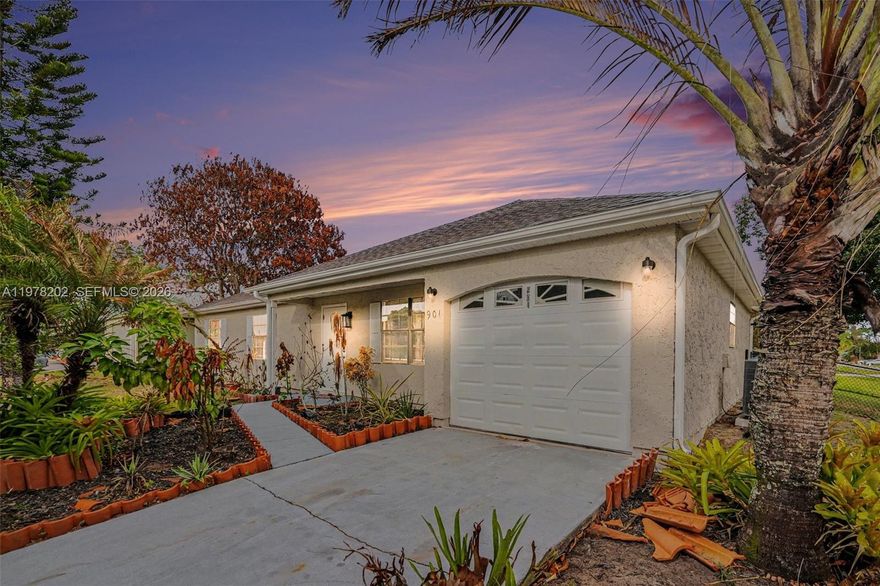 Step into this stunning, move-in-ready sanctuary where modern elegance meets comfortable living. From the moment you arrive, you'll be captivated by the home's curb appeal, featuring a well-maintained stucco exterior, a pristine concrete driveway leading to a one-car garage, and a beautifully landscaped yard accented by mature trees. Inside, the home unfolds into a bright and airy open-concept layout, perfectly designed for both quiet evenings and grand entertaining. The living spaces are anchored by stylish, high-durability laminate wood-style flooring that flows seamlessly through the family and dining areas. This home features a new roof,tThe kitchen is newly remodeled, updated bathrooms, a separate laundry room, and extensive backyard with mature fruit trees for the tasting! The house is available for rent starting May 1st.