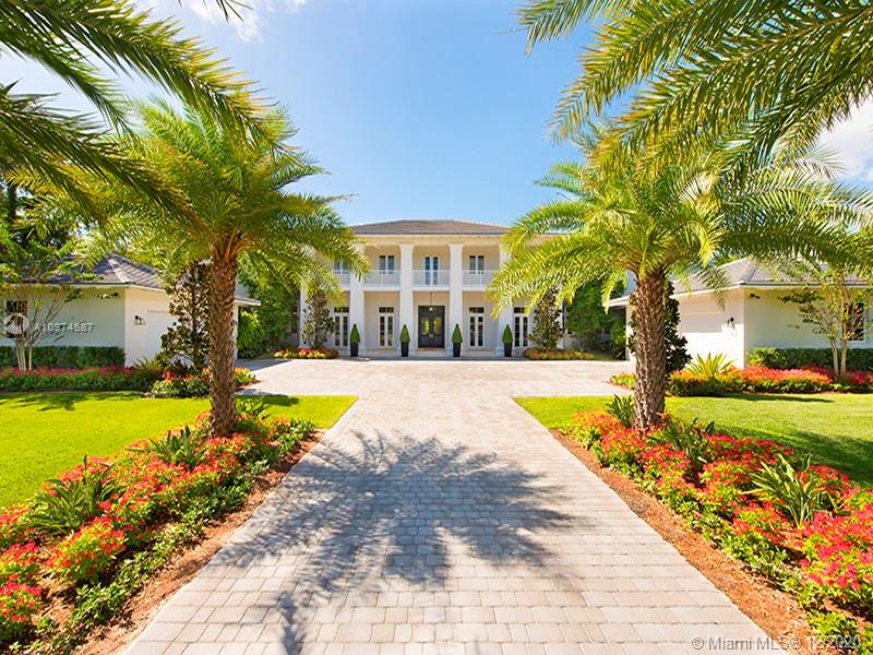 A One Of A Kind Ponce Davis Colonial Style Estate Designed by Cesar Molina. 7 Bedrooms and 8 1/2 bathrooms, 13,482 adjustable sq. ft. Luxurious living areas include media room/office and gym. Elevator. Private guest house & maids quarter with separate entrances. 4 CAR garage. Limestone through out the home. Teak wood floor in Master Suite with his & hers restrooms. Grand Master Custom built closet adorned with a crystal chandelier. Gourmet kitchen with top of the line Wolf appliances & Carrara marble tops. Luscious landscaping with magnolia and oak trees. Plantations shutters and custom closet systems through out the home. Alarm, Gated & Camera system. Call listing agent for more detailed information.