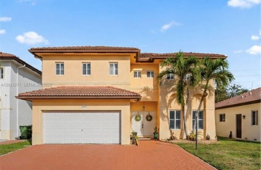 Welcome to this beautifully upgraded 3-bedroom, 3-bathroom home located in one of Homestead's most desirable and growing communities. This move-in-ready property combines modern design with functional living, perfect for families or professionals seeking comfort and style. Step inside to an open-concept layout filled with natural light and enhanced by sleek modern wall paneling in the living room, creating a clean, upscale look. The kitchen flows seamlessly into the dining and living areas, making it ideal for entertaining and everyday living. The home features three spacious bedrooms and three full bathrooms, offering flexibility and privacy for guests or a home office setup. Enjoy a low-maintenance outdoor space with a turf backyard, perfect for relaxing, entertaining, or enjoying year-round greenery without the upkeep. The garage is a standout feature, finished with durable epoxy flooring, giving it a polished, high-end feel perfect for parking, storage, or even a home gym setup. Property Highlights: 3 Bedrooms / 3 Full Bathrooms Open-concept layout with modern finishes Stylish living room with custom wall paneling Updated kitchen with great flow for entertaining Epoxy-finished garage Private backyard with turf Located in a quiet, well-kept community Close to shopping, dining, schools, and major highways
