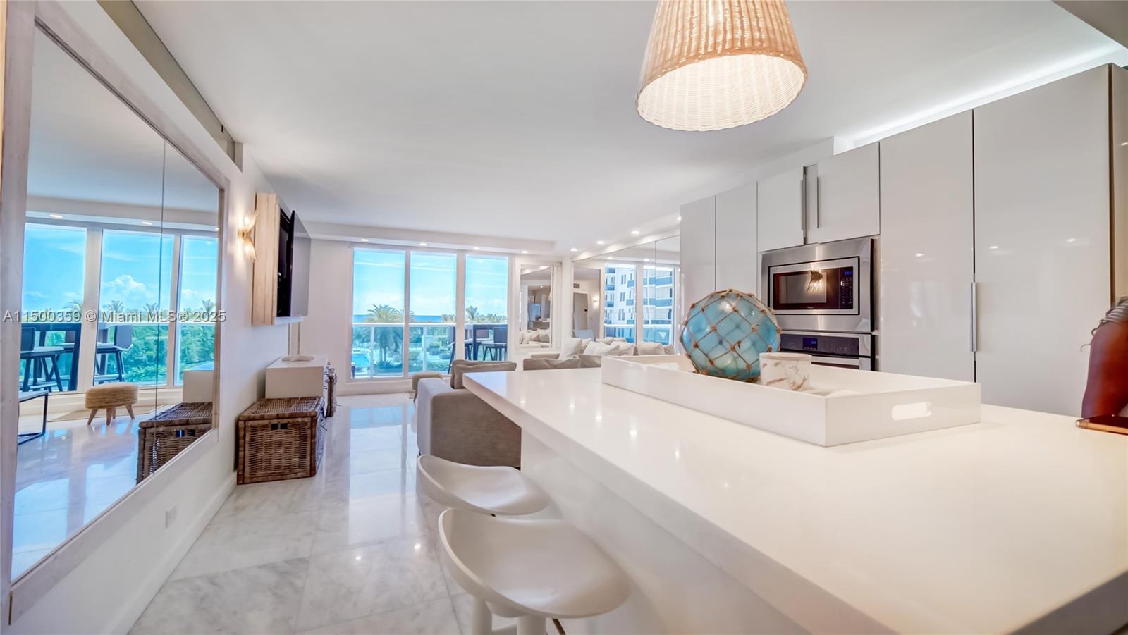 Gorgeous direct ocean view one bedroom plus den, used as a second bedroom, with two full bathrooms. The unit is updated, fully furnished with new furniture, and tastefully decorated. A stunning view of the ocean and the brand new South Pool. Features include custom-made mirrors, an elegant Onare closet, and an in-unit washer and dryer
Tenants enjoy access to the luxurious amenities of the One Hotel, including pools, beach and pool service, restaurants, bars, and a full gym for an additional fee.The rental includes one valet parking space, water, cable, and internet.Ideally located near Lincoln Road and some of Miami’s best restaurants, shopping, and entertainment.
Contact the listing agent for more information or to schedule a private tour. A 3D virtual tour is also available.