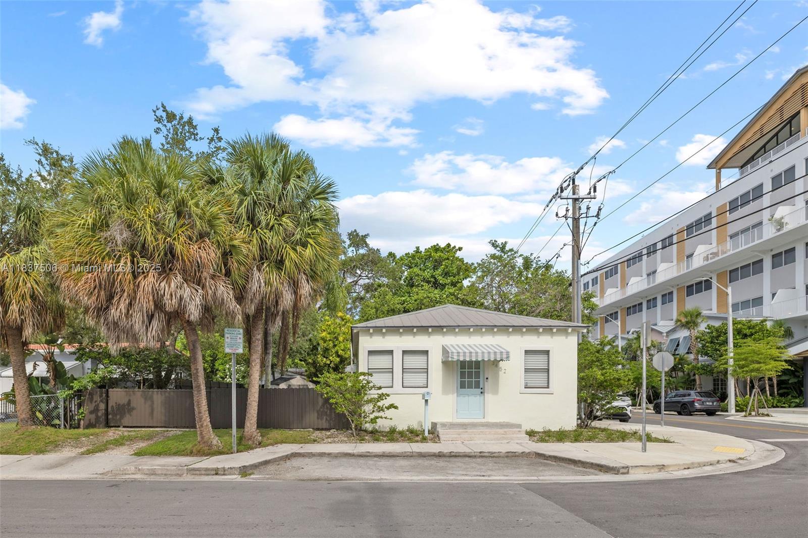 Charming coastal-style 3BR/3BA cottage in A PRIME LOCATION in Coconut Grove! Nestled on a lush, private corner lot beneath mature oak trees, this home features an open-concept layout with high ceilings and natural light. The spacious backyard is ideal for entertaining. Includes private gated parking for 3 cars and a separate laundry room with washer/dryer. Near top-rated schools, marinas, sailing clubs, fine dining, boutiques, and cafes. Step from your front stoop into the Grove’s vibrant lifestyle—where nature, cultural energy, and everyday conveniences are just moments away.
