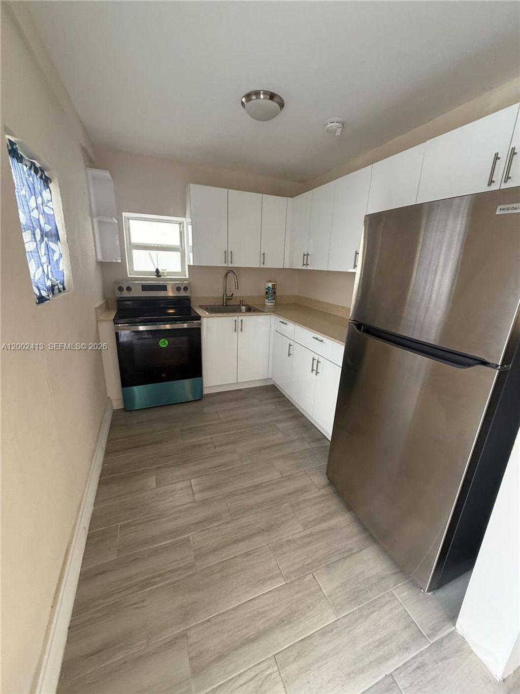 Photo of 613 NW 15th Ave Unit 1-, Pompano Beach, FL 33069 (MLS # A12002413)