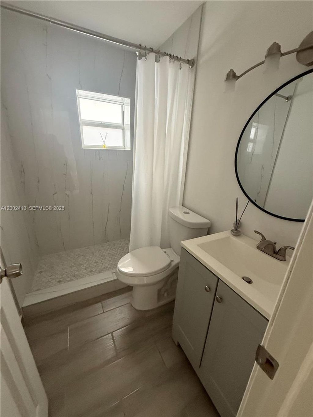 Photo of 613 NW 15th Ave Unit 1-, Pompano Beach, FL 33069 (MLS # A12002413)