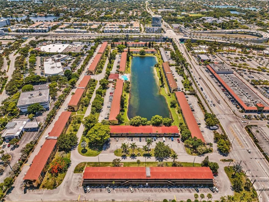 ALL AGES> Upgraded condo in the heart of Aventura! This spacious 2-bedroom, 2-bath unit features a versatile additional room that is ideal for a home office or guest space. Features include modern vinyl flooring, large IMPACT WINDOWS that fill the home with natural light, and an updated kitchen with wood cabinets, quartz countertops, and ample storage. The community offers a clubhouse and a large pool area for relaxation. Ideally located just steps from Aventura Mall, dining, and shops, directly across from the Brightline station, with easy highway access—only 1 mile from Sunny Isles Beach! A convenient and stylish place to call home.
