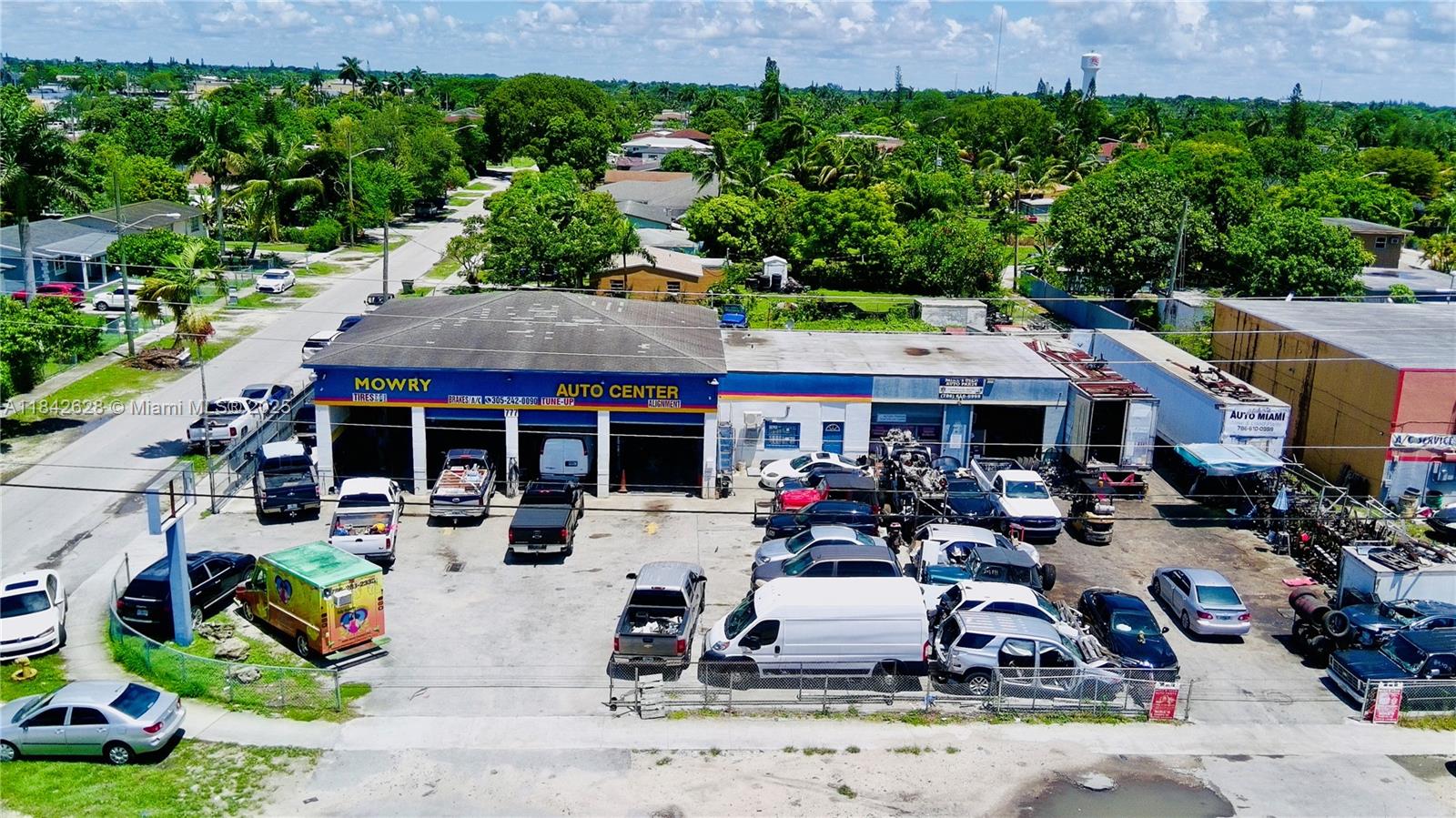 Mowry Auto Center is a Full Service Automotive Center with Outside Storage Yard 5,000 SQ FT.
This Property is located 1 mile from Downtown Homestead & US 1 sitting on the main street Mowry and cornering 7 Avenue.
This property has 8 fully equipped Drive in Bays for Auto Service with Private fence in parking.
Property also has an outside Storage Yard 25 NW 8 Avenue for outside storage and car/ parts storage.
Site also includes 600 SQ FT private office.