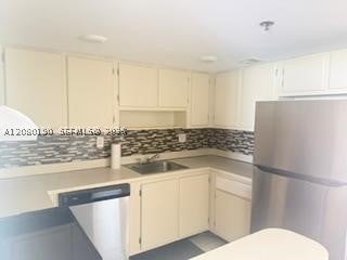 Photo of 3150 W Rolling Hills Cir #403, Davie, FL 33328 (MLS # A12080190)