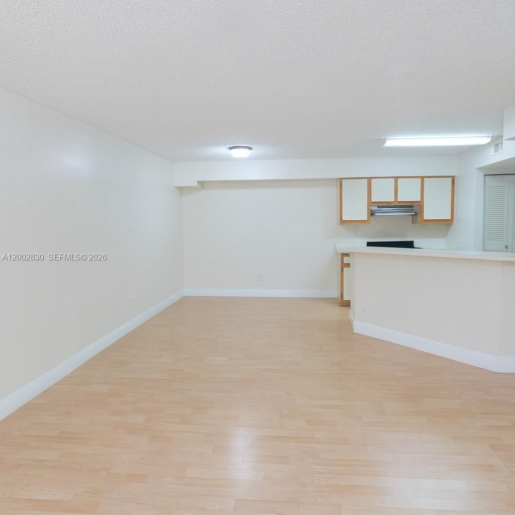 Photo of 9999 Summerbreeze Dr #216, Sunrise, FL 33322 (MLS # A12002830)