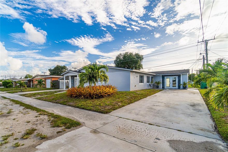 This spacious and well-maintained home offers a perfect layout for a large family. This home has been updated with impact windows and doors and features stainless steel appliances that are just 2 years old. A complete remodel was done just 8 years ago (including Roof, plumbing, electrical, drywall, and installation in walls and attic) so you can move right in! The master bedroom suite features a walk-in closet and the 5th bedroom is currently used as an office. Plus, there is plenty of extra parking/storage with a carport, driveway, and detached shed. The location can't be beat.   It's close to the Hard Rock Stadium, shopping centers, and the expressway.