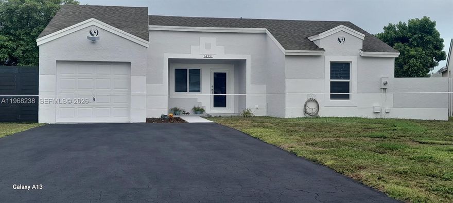 Newly remodeled home located in the highly desired Panache community, 3 bedrooms, 2 baths (permitted garage was converted with own ac unit and may be used as a home office or rental studio) corner property on an oversized lot front and backyard. Home includes new hurricane rated high-impact doors and windows, spacious dining and living areas, high-vaulted ceiling, oversized bone colored tile floor throughout. Kitchen is well kept with kitchen cabinets, granite counter, along with stainless-steel appliances.  Master bedroom has a newly tiled shower area with rainfall shower, and the configuration is the same as the second bathroom, central air conditioning, and a barely used roof installed 2019, central air conditioner, washer and dryer.