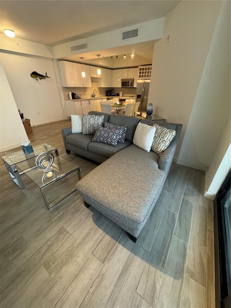 This stunning condo offer a beautifully designed living space, located in the heart of vibrant Brickell. With Sunny living area opening to a lovely terrace overlooking the building’s recreation deck. Perfect for relaxing or entertaining. Fully equipped kitchen with space for a dining set (fits a table & 6 chairs), ideal for hosting. In-unit washer & dryer for your convenience. Covered garage for 1 car. Top-notch building amenities: Nine at Mary Brickell Village is a full-service luxury high-rise with resort-style living and a Walk Score of 100: Heated pool & spa, and half-acre amenity deck. Fully-equipped fitness center, Business center, children’s playroom, library, and clubroom. 24-hour valet, concierge, and security services. Steps away from Brickell Metromover & Metrorail stations.