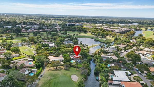 Rare Gem in renowned Emerald Hills. This 4,048 SF single-story home on the 3rd largest waterfront lot in the area, spanning 17,936 SF with 195ft. of ocean-access canal. Boasting 6 bed, 3 bath and a family room/office. Located on a quiet dead-end street with only 1 neighbor, a golf course, and a tranquil canal for privacy. Enter a bright Great Room with skylights and soaring beams, leading to a living/dining area filled with natural light and views of the Extra Large heated pool and large backyard—ideal for entertaining. The kosher kitchen features a breakfast nook facing the pool. A true Family Dream
Close to parks, top schools, shopping, highways, Aventura Mall, Sawgrass Mills, and houses of worship, this family-friendly home needs a touch of TLC to shine. Easy to show—a must-see!
