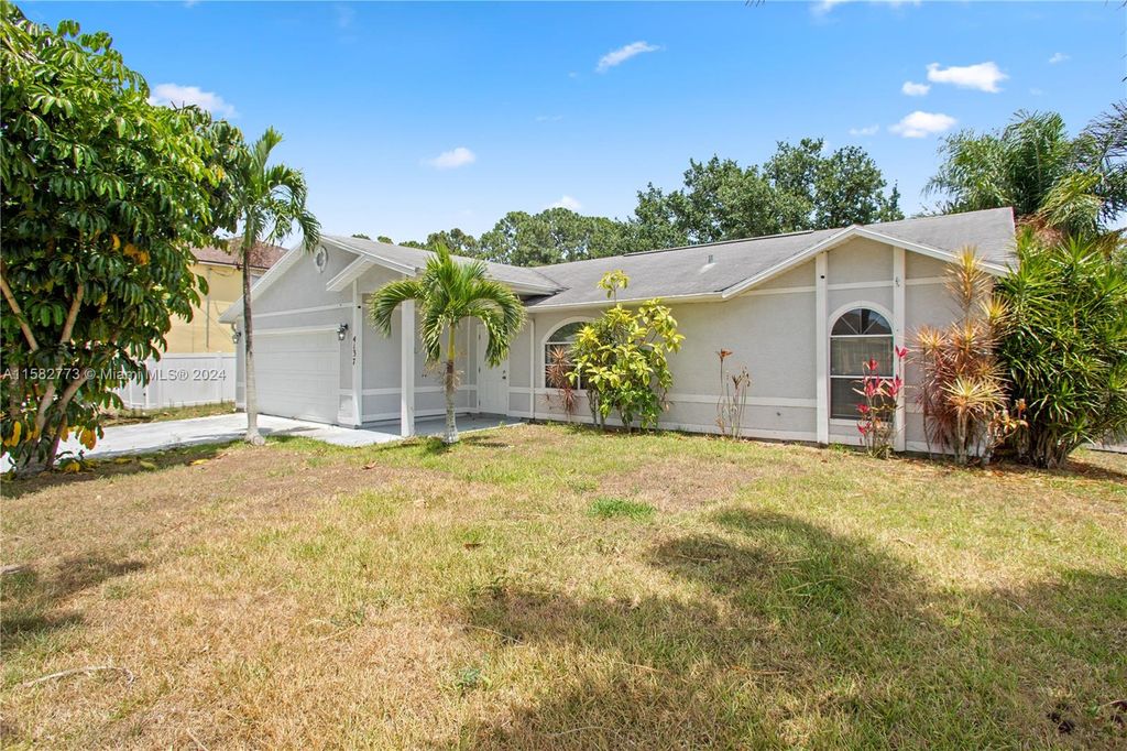 Photo of 4137 SW Batavia St, Port Saint Lucie, FL 34953 (MLS # A11582773)