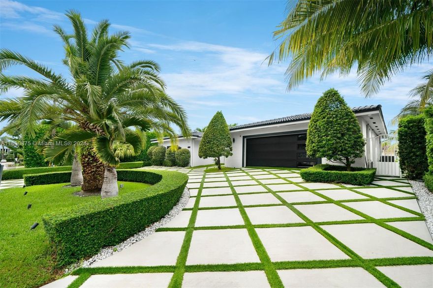 This is your chance for waterfront living in the gated community of Eastern Shores.  This nicely updated home sits on 75' of water with easy ocean access.  Home has updated kitchen and baths.  Driveway has recently been redone.  The front door is being replaced in the coming weeks.  This is a great opportunity to have your waterfront home in Miami.  Seller is motivated for a quick sale.  House is also available for rent at $14,500 per month annually.