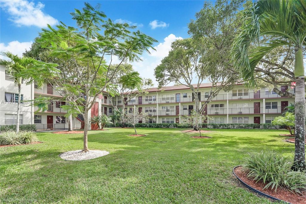 Photo of 13500 SW 1st St #206U, Pembroke Pines, FL 33027 (MLS # A11970369)
