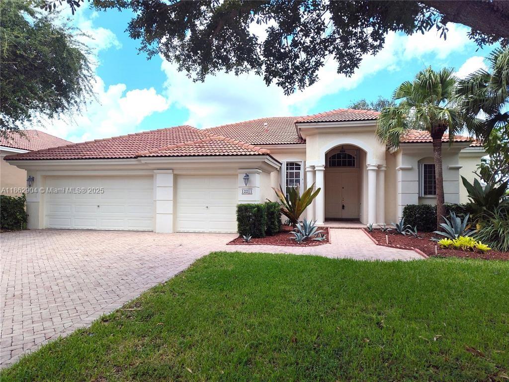Welcome to Wyndham Lakes! Located in prestigious Bay Pointe Community. Waterfront Pool Home with Popular Triple-Split Floor plan w/4 Beds, 3 Baths, 3-Car Garage, Pavered-Patio Driveway, Accordion Hurricane Shutters, Updated Patio Oasis, Updated Pool, Plenty of Room For Entertaining, Overlooks Tranquil Water Views, Take In Beautiful Sunsets! Upgraded Floors Throughout Main Living, Laminate Floors In Secondary Beds and in Primary Bed, Large Primary Bed w/Sitting Area Overlooking Back Patio, Walk-In Closets, High Ceilings, Modern Kitchen w/Custom Wood Cabinets, Stainless Steel Appliances, & Brilliant Quartz Counters, Lush Landscaping with Mature Trees & Zoned For Stoneman Douglas High and other excellent schools. Easy to Show.