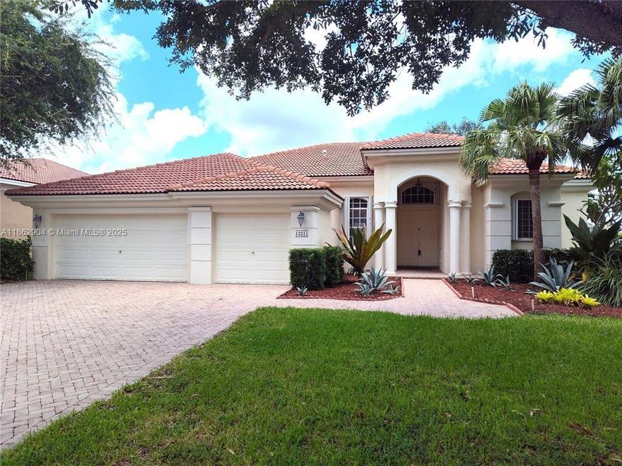 Welcome to Wyndham Lakes! Located in prestigious Bay Pointe Community. Waterfront Pool Home with Popular Triple-Split Floor plan w/4 Beds, 3 Baths, 3-Car Garage, Pavered-Patio Driveway, Accordion Hurricane Shutters, Updated Patio Oasis, Updated Pool, Plenty of Room For Entertaining, Overlooks Tranquil Water Views, Take In Beautiful Sunsets! Upgraded Floors Throughout Main Living, Laminate Floors In Secondary Beds and in Primary Bed, Large Primary Bed w/Sitting Area Overlooking Back Patio, Walk-In Closets, High Ceilings, Modern Kitchen w/Custom Wood Cabinets, Stainless Steel Appliances, & Brilliant Quartz Counters, Lush Landscaping with Mature Trees & Zoned For Stoneman Douglas High and other excellent schools. Easy to Show.