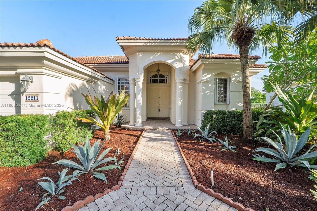 Photo of 12211 NW 49th St, Coral Springs, FL 33076 (MLS # A11862904)