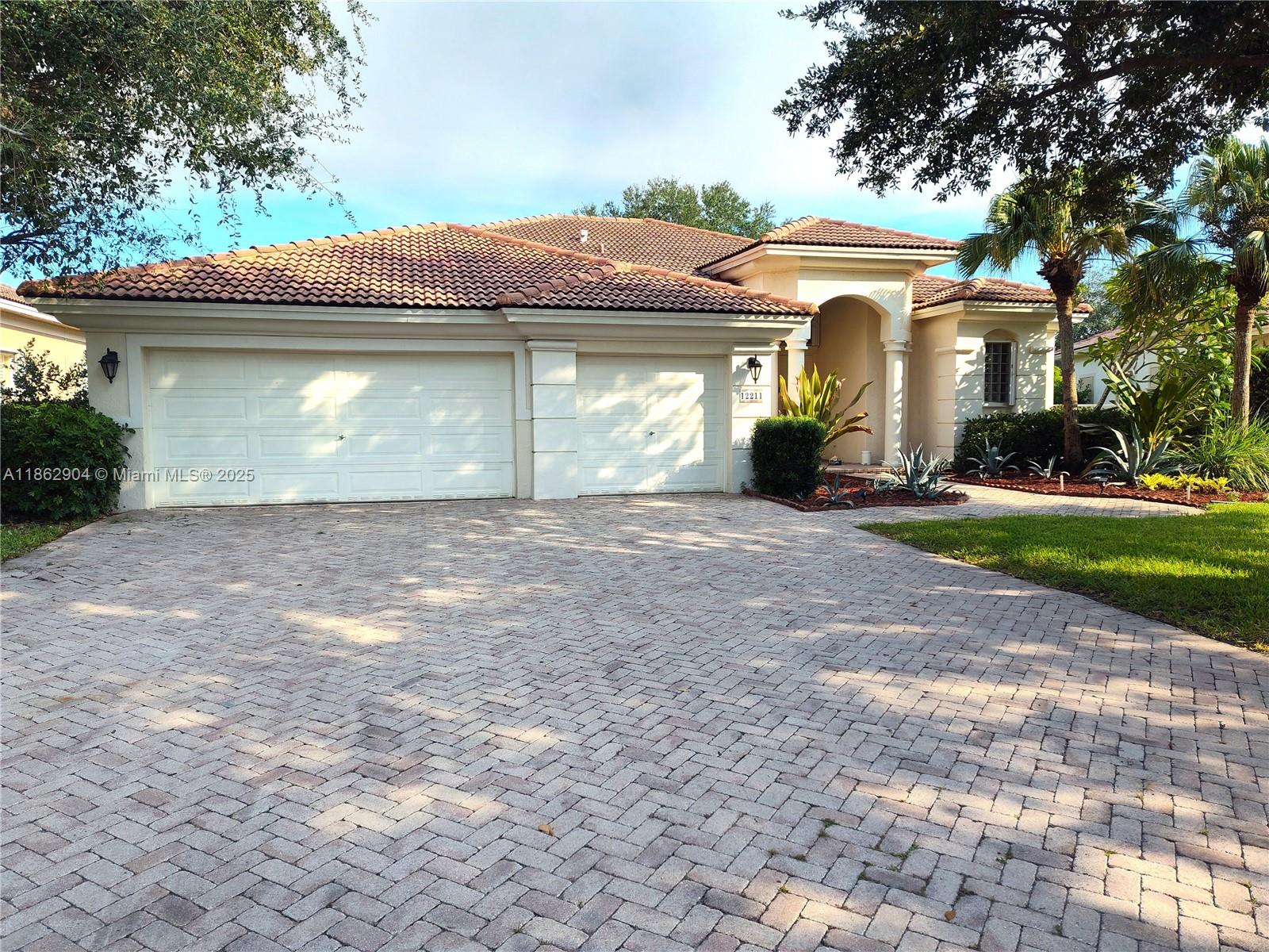 Welcome to Wyndham Lakes! Located in prestigious Bay Pointe Community. Waterfront Pool Home w/Over $100K In Upgrades! Popular Triple-Split Floor plan w/4 Beds, 3 Baths, 3-Car Garage, Pavered-Patio Driveway, Accordion Hurricane Shutters, Updated Patio Oasis, Updated Pool, Plenty of Room For Entertaining, Overlooks Tranquil Water Views, Take In Beautiful Sunsets! Upgraded Floors Throughout Main Living, Laminate Floors In Secondary Beds and in Primary Bed, Large Primary Bed w/Sitting Area Overlooking Back Patio, Walk-In Closets, High Ceilings, Modern Kitchen w/Custom Wood Cabinets, Stainless Steel Appliances, & Brilliant Quartz Counters, Lush Landscaping with Mature Trees & Zoned For Stoneman Douglas High and other excellent schools. Easy to Show.