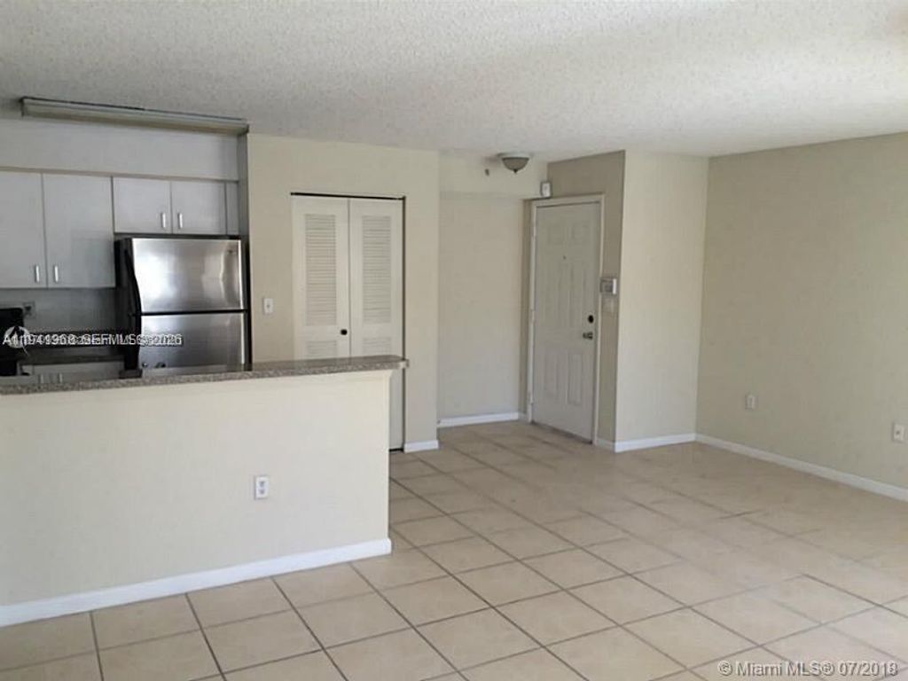 Photo of 761 N Pine Island Rd #203, Plantation, FL 33324 (MLS # A11941368)